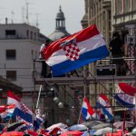 Across the square many Croatian flags were waving